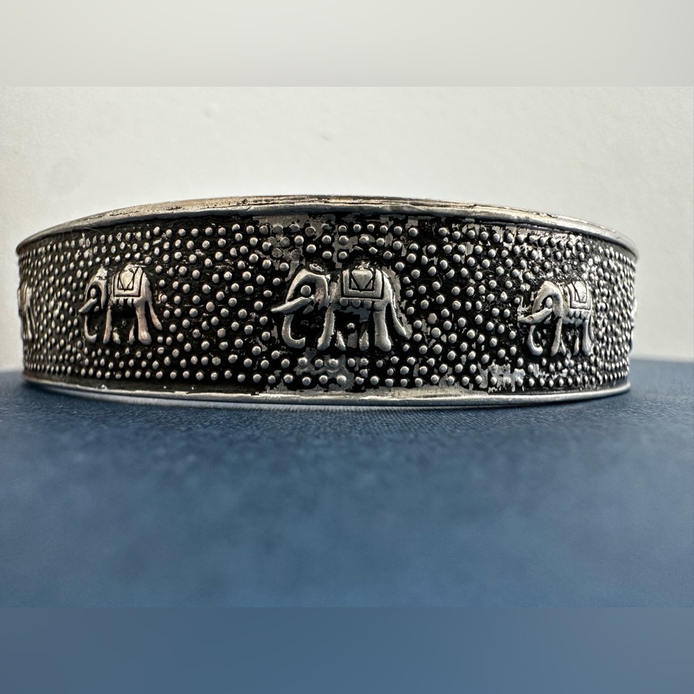 Silver bracelet, happy elephants.